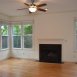 HUGE family room has a wood burning fireplace, ceiling fan, wood floors & great windows! HUGE family room has a wood burning fireplace, ceiling fan, wood floors & great windows!
