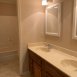 Primary bath has 2 sinks that are separate from the tub/shower area.