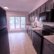 Kitchen w/good cabinet space & solid counters